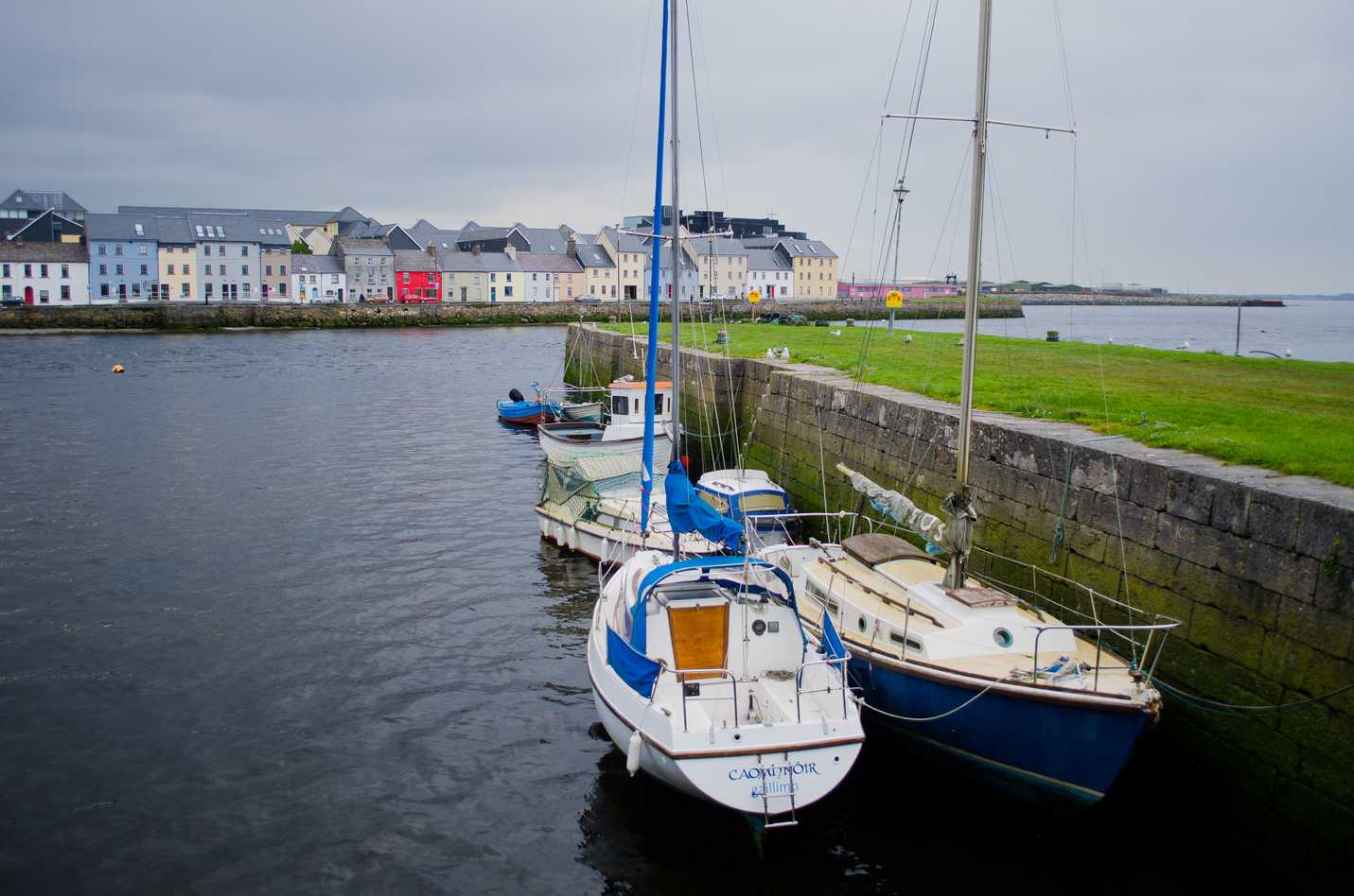 Boats and colorful houses of Galway