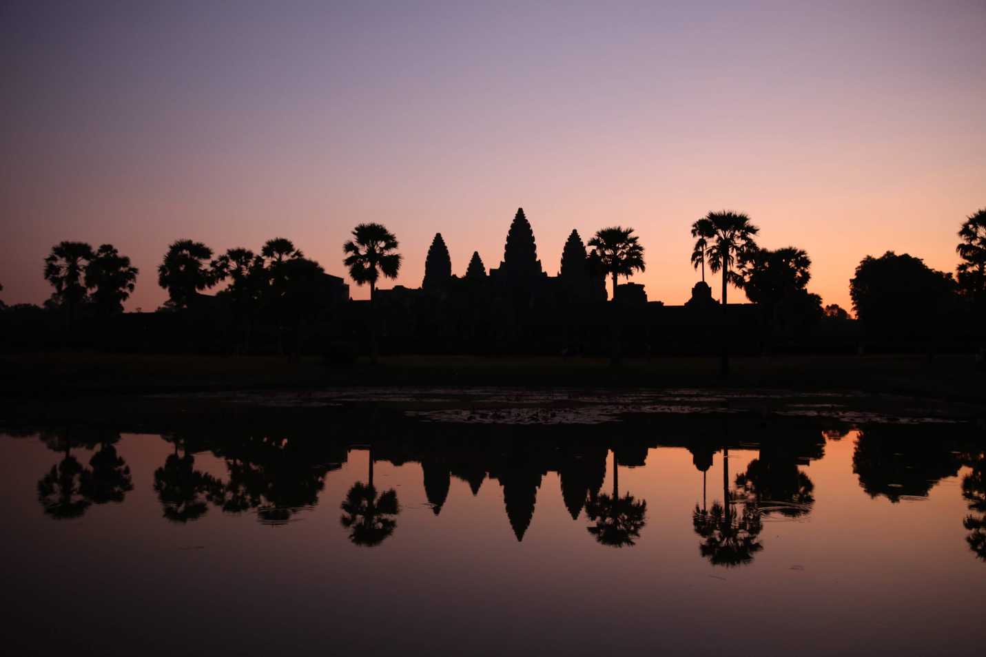 Different phases of sunrise at Angkor Wat