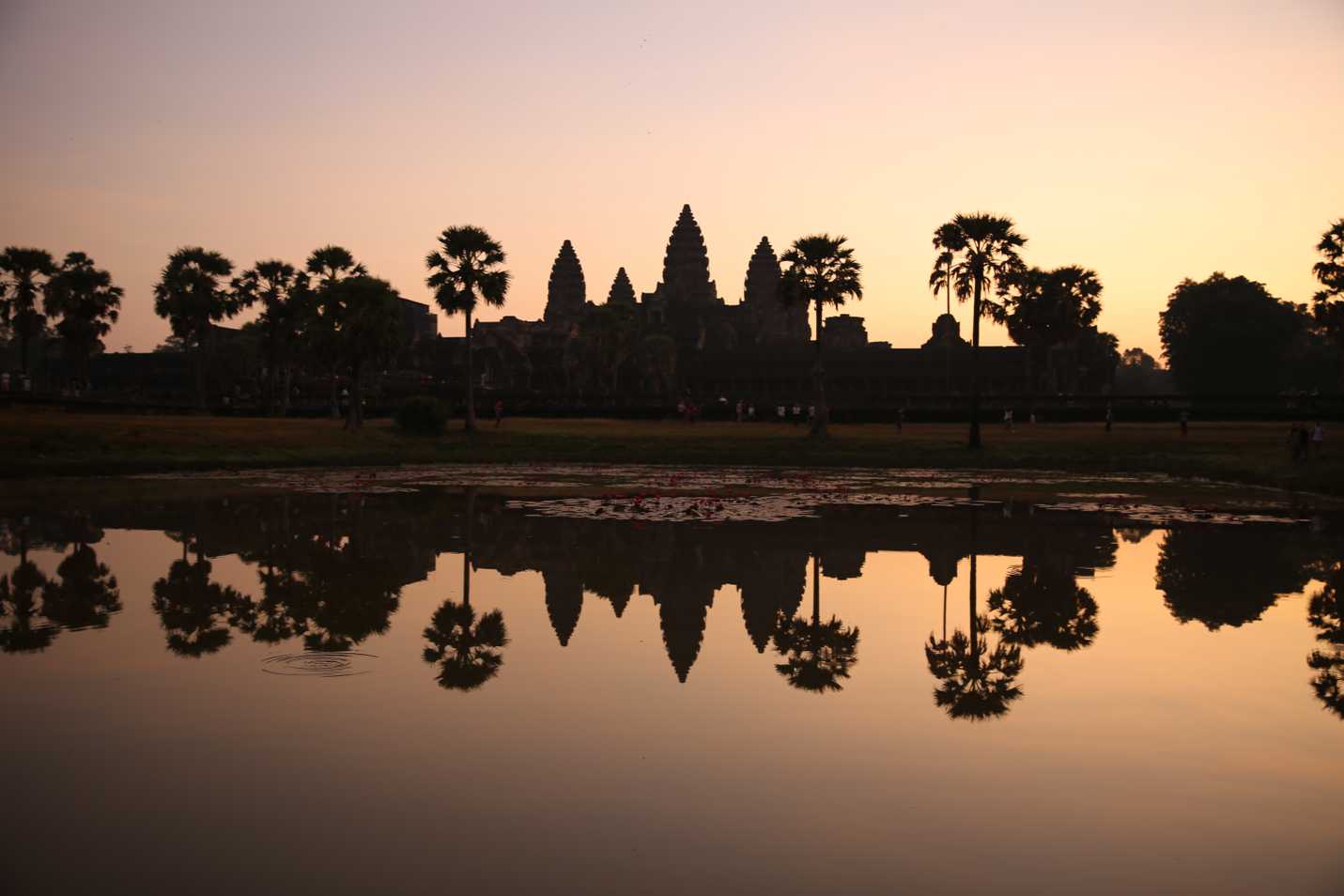 Different phases of sunrise at Angkor Wat
